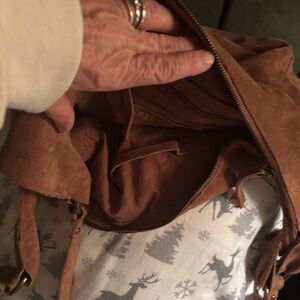Free People Brown Suede Bag . Like new. No imperfections. Beautiful, stylish